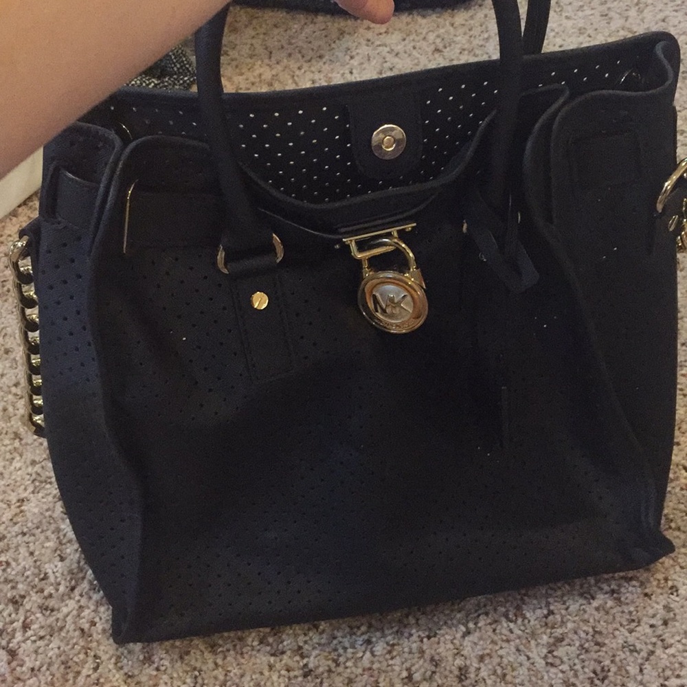 Michael kors perforated black leather Satchel